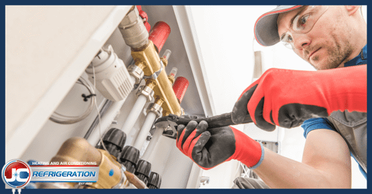 Someone working on a home appliance